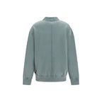 Gray cotton cardigan from Isabel Marant Étoile, featuring a relaxed fit and button-front design, styled on a model.