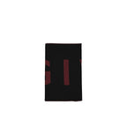 Black Virgin Wool scarf by Givenchy with a soft, luxurious texture and classic design, draped elegantly.