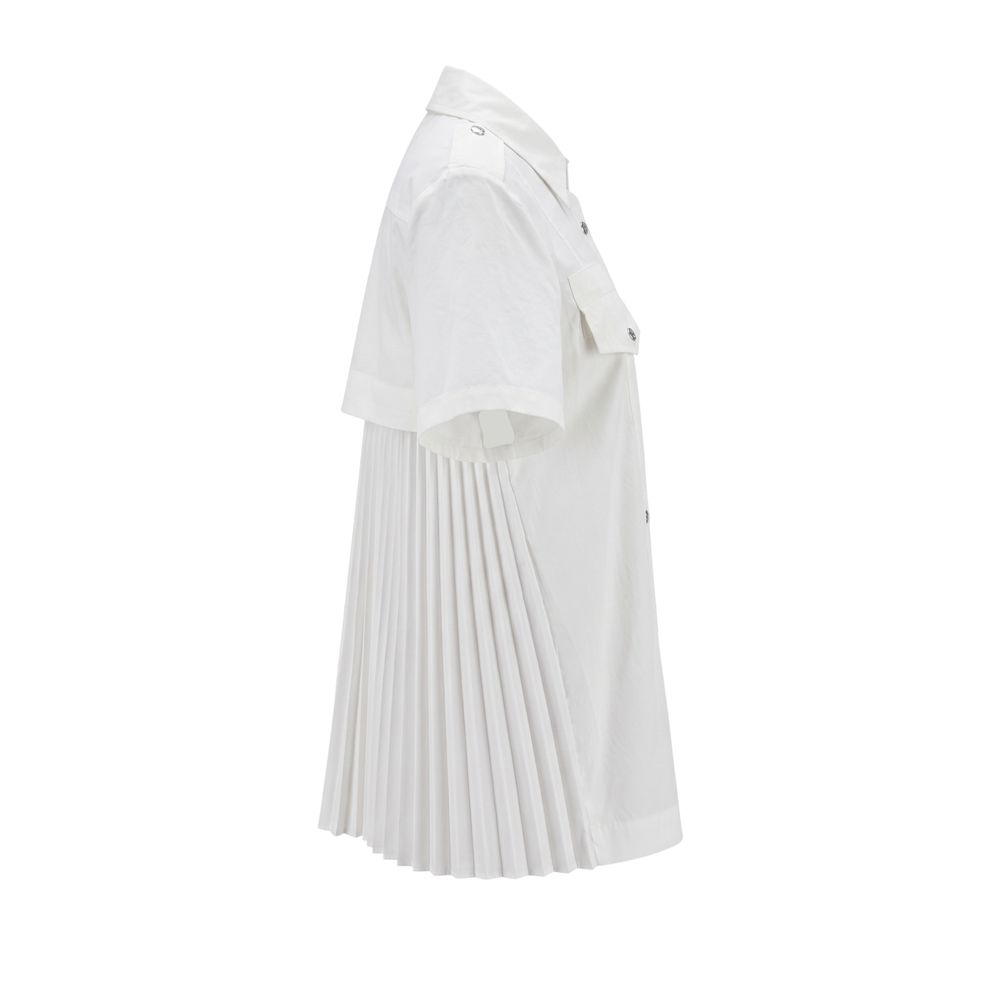 White cotton women’s shirt by Mr&Mrs Italy, casual long-sleeve top with a classic fit and button-front design.
