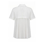 White cotton women’s shirt by Mr&Mrs Italy, featuring a classic fit and button-front design, seen on a model.