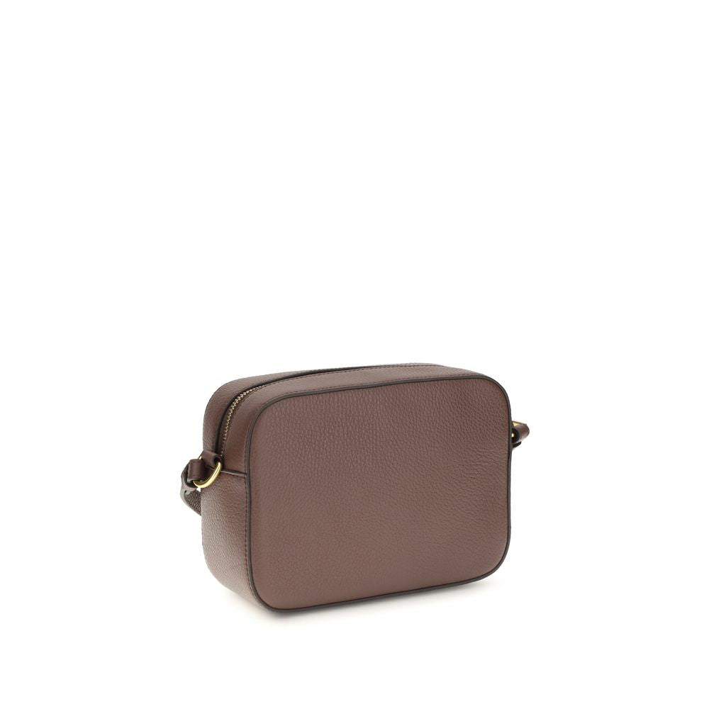 Coccinelle brown calf leather Bos Taurus shoulder bag with silver hardware and adjustable strap on a plain background.