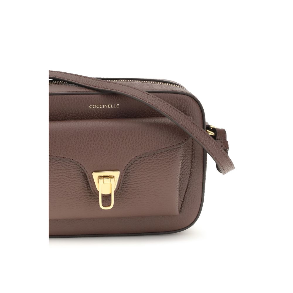 Coccinelle brown calf leather Bos Taurus shoulder bag with sleek design and top handle, stylish for everyday use.