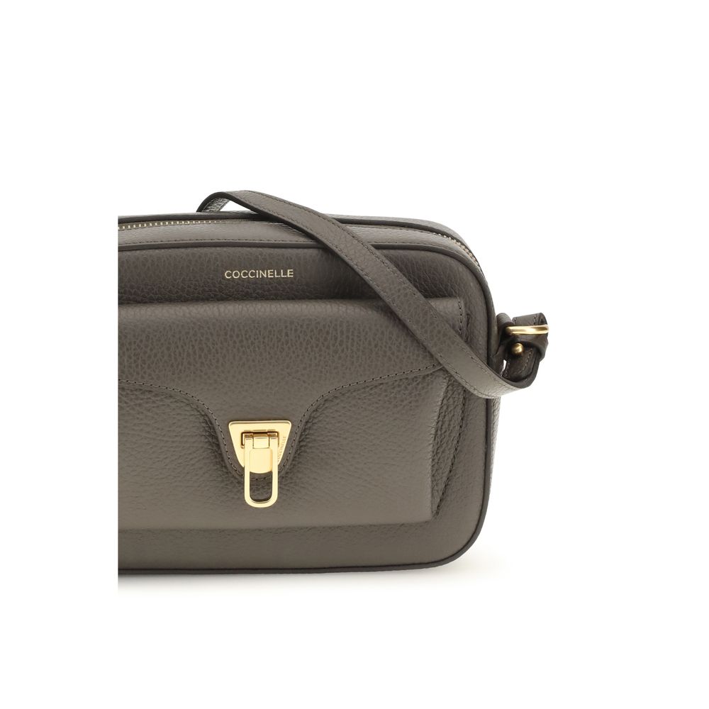 Brown calf leather Coccinelle Bos Taurus shoulder bag with sleek design and subtle branding.