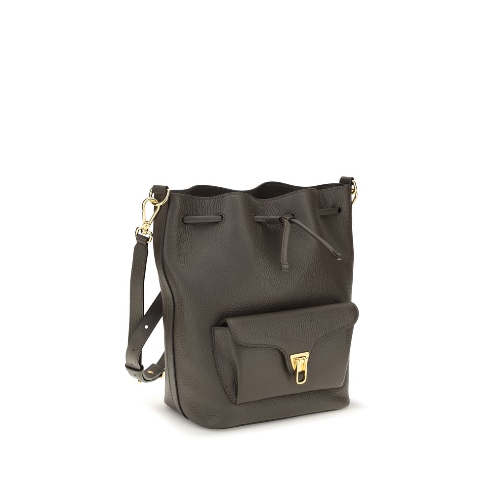 Coccinelle brown calf leather Bos Taurus backpack bag with sleek design and sturdy straps.
