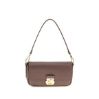 Coccinelle brown calf leather Bos Taurus shoulder bag with sleek design and gold-tone hardware, textured surface, and shoulder strap.