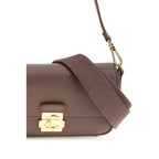 Brown calf leather Coccinelle Bos Taurus shoulder bag with sleek design and gold-tone hardware.