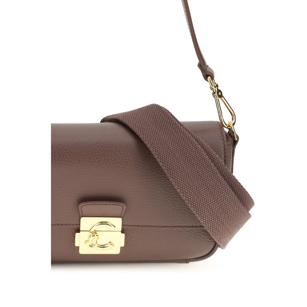 Brown calf leather Coccinelle Bos Taurus shoulder bag with sleek design and gold-tone hardware.