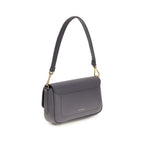 Blue calf leather Coccinelle Bos Taurus shoulder bag with silver hardware and structured design, showcasing a stylish and elegant accessory.