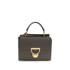 Coccinelle brown calf leather Bos Taurus shoulder bag with sleek design and adjustable strap, showcasing elegant craftsmanship.