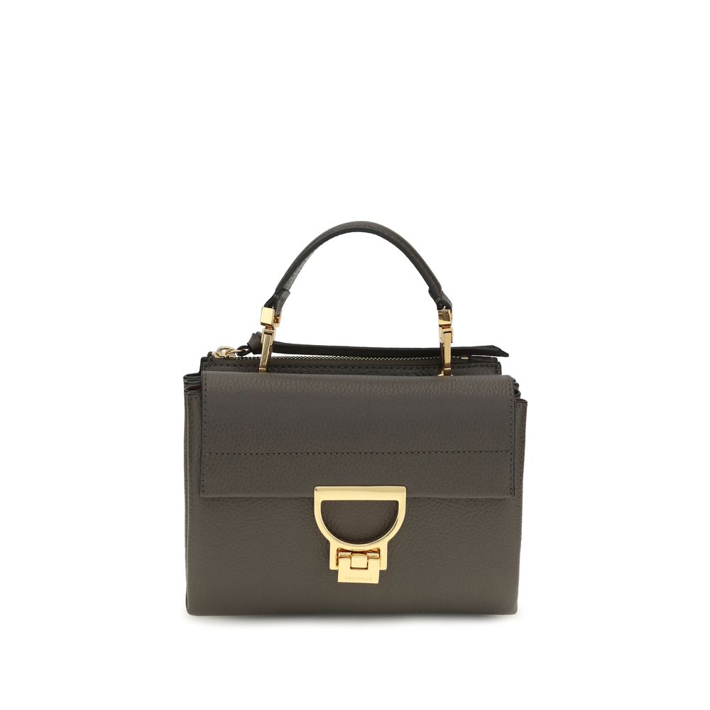 Coccinelle brown calf leather Bos Taurus shoulder bag with sleek design and adjustable strap, showcasing elegant craftsmanship.