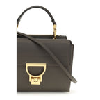 Coccinelle brown calf leather Bos Taurus shoulder bag with sleek design and shoulder strap, showcasing high-quality craftsmanship.