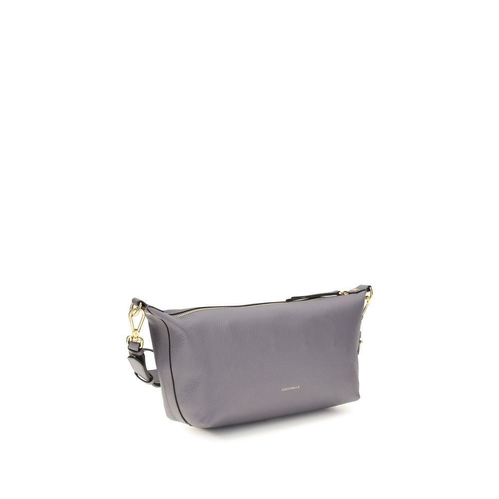 Gray calf leather Coccinelle Bos Taurus shoulder bag with sleek design and subtle branding, featuring a shoulder strap and polished hardware.