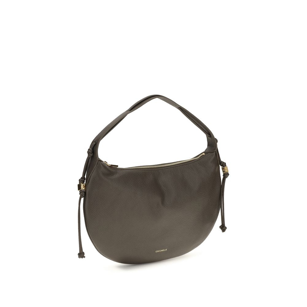 Coccinelle brown calf leather Bos Taurus shoulder bag with silver hardware and adjustable strap, stylish and elegant design.