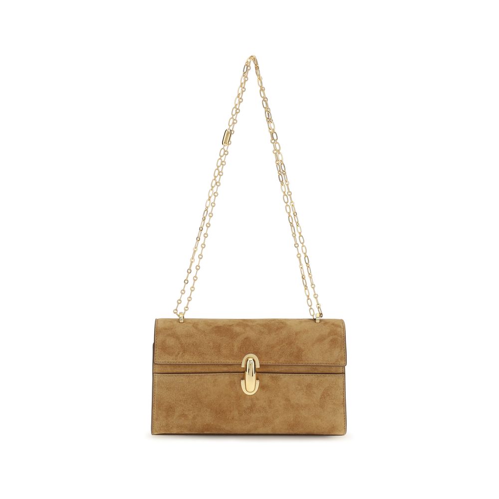 Savette brown calf leather Bos Taurus clutch bag with sleek design and minimalistic style on a plain background