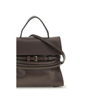 Moschino brown goatskin handbag with top handles and gold-tone hardware, showcasing a stylish, luxurious leather accessory.