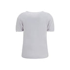 White linen T-shirt by Isabel Marant Étoile, featuring a relaxed fit and simple design, shown on a model.