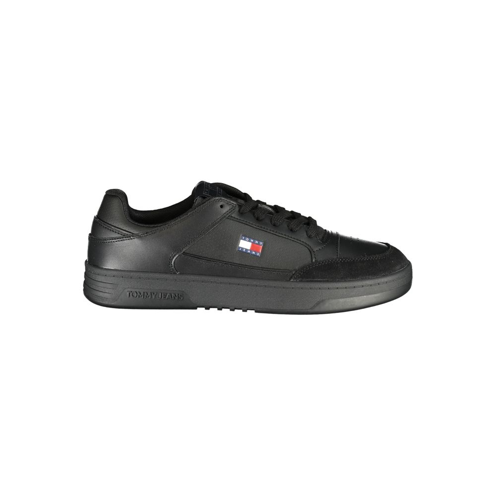 Tommy Hilfiger black polyurethane men's sneaker with sleek design and white sole, showcasing the stylish athletic footwear.