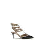 Valentino Garavani black calf leather Bos Taurus mid heel pumps, stylish women's footwear with sleek design and comfortable heel height.