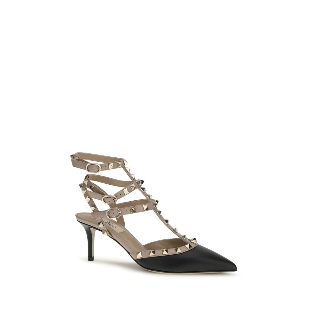 Black calf leather Valentino Garavani Bos Taurus mid heel pumps with sleek design and elegant silhouette.