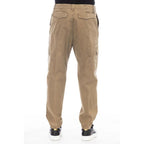 Brown cotton men's pants by Peserico, featuring a tailored fit and classic style, shown on a model.