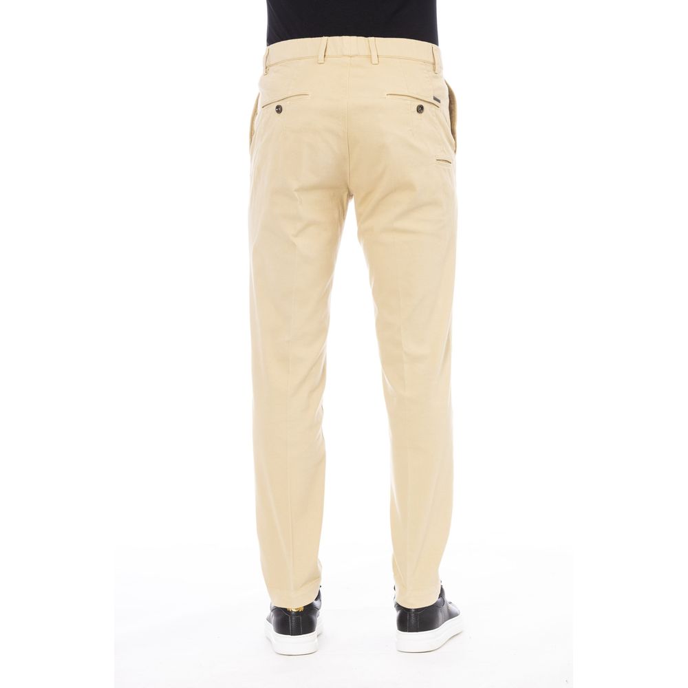 Beige cotton men's pants by Peserico featuring a tailored fit and classic design, displayed on a neutral background.
