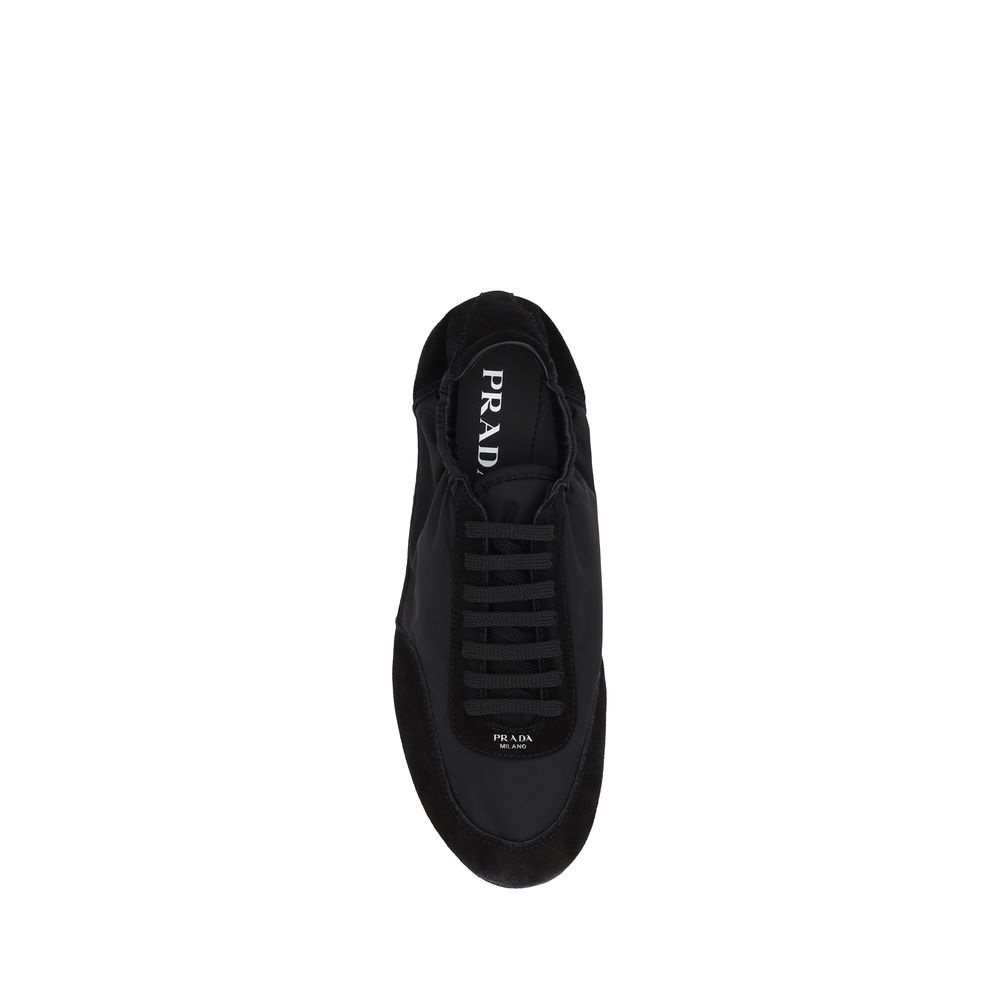 Prada Bos Taurus athletic sneakers in black calf leather with sporty design and white sole, stylish and comfortable footwear.