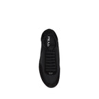 Prada Bos Taurus athletic sneakers in black calf leather with sporty design and white sole, stylish and comfortable footwear.