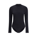 Wolford black polyamide bodysuit displayed on a model, showcasing sleek fit and smooth fabric for stylish, comfortable wear