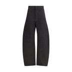 Black cotton casual pants by Lemaire, shown hanging with a relaxed fit and minimalist design.