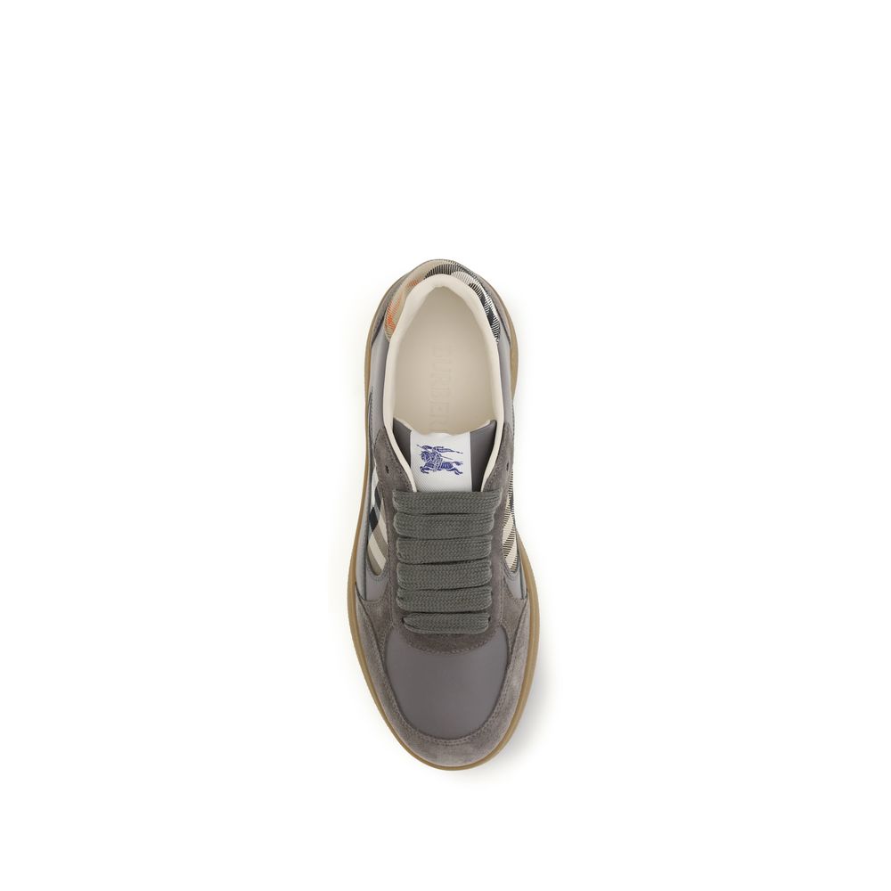 Burberry gray calf leather Bos Taurus low top sneakers with white soles and sleek design.