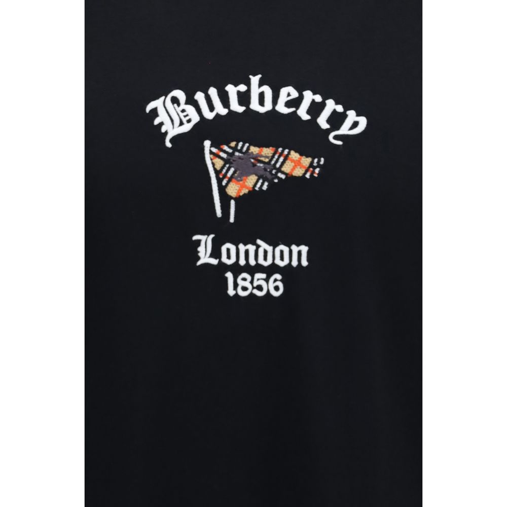 Black cotton T-shirt by Burberry with subtle logo detail, casual fit, and classic crew neckline.
