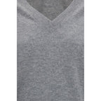 Brunello Cucinelli gray cashmere sweater displayed on a hanger, showcasing soft knit fabric and classic crewneck style.