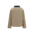 Beige Brunello Cucinelli cotton full-length jacket displayed on a hanger, showcasing the sleek, tailored design and high-quality fabric.