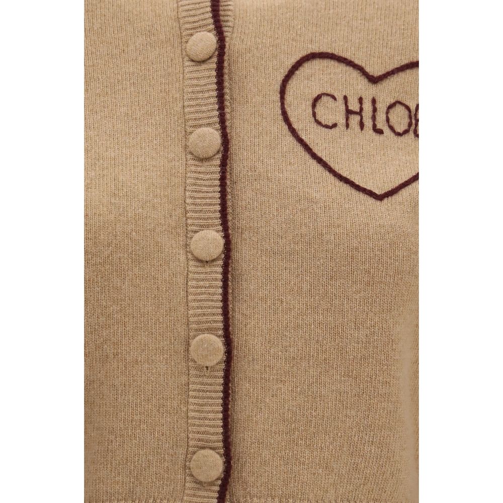 Chloé beige wool Aries cardigan with a cozy, textured knit, featuring a relaxed fit and elegant design for stylish comfort.