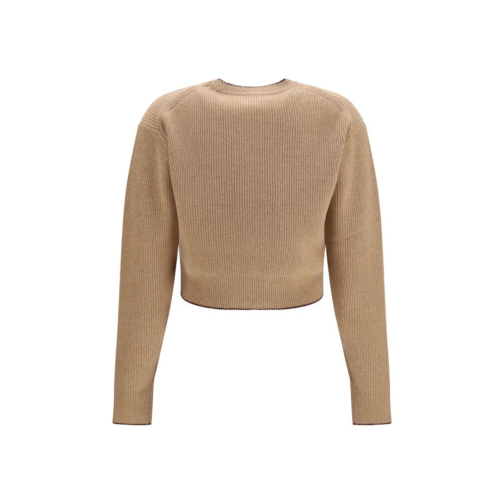 Chloé beige wool Oves Aries sweatshirt displayed flat, showing its soft fabric and relaxed fit with subtle branding details.