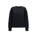 Black cashmere sweatshirt by Loulou De Saison with a relaxed fit and soft texture, displayed on a model.