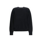 Black cashmere sweatshirt by Loulou De Saison displayed on a hanger, showcasing soft, luxurious fabric and casual style.