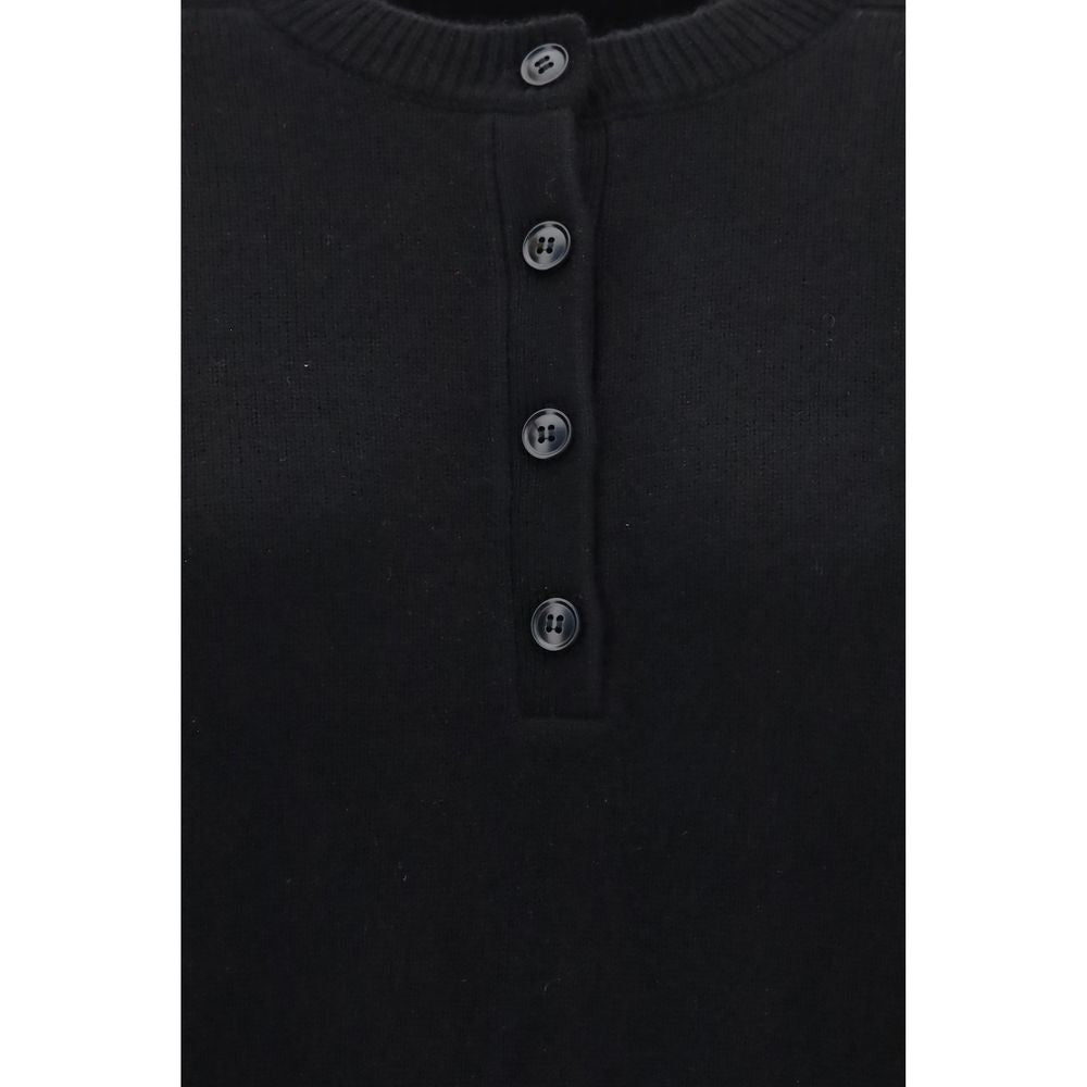 Loulou De Saison black cashmere sweatshirt with a relaxed fit and soft texture, displayed on a plain background.