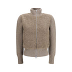 Herno beige wool Aries cardigan with button closure and ribbed cuffs, displayed on a hanger.