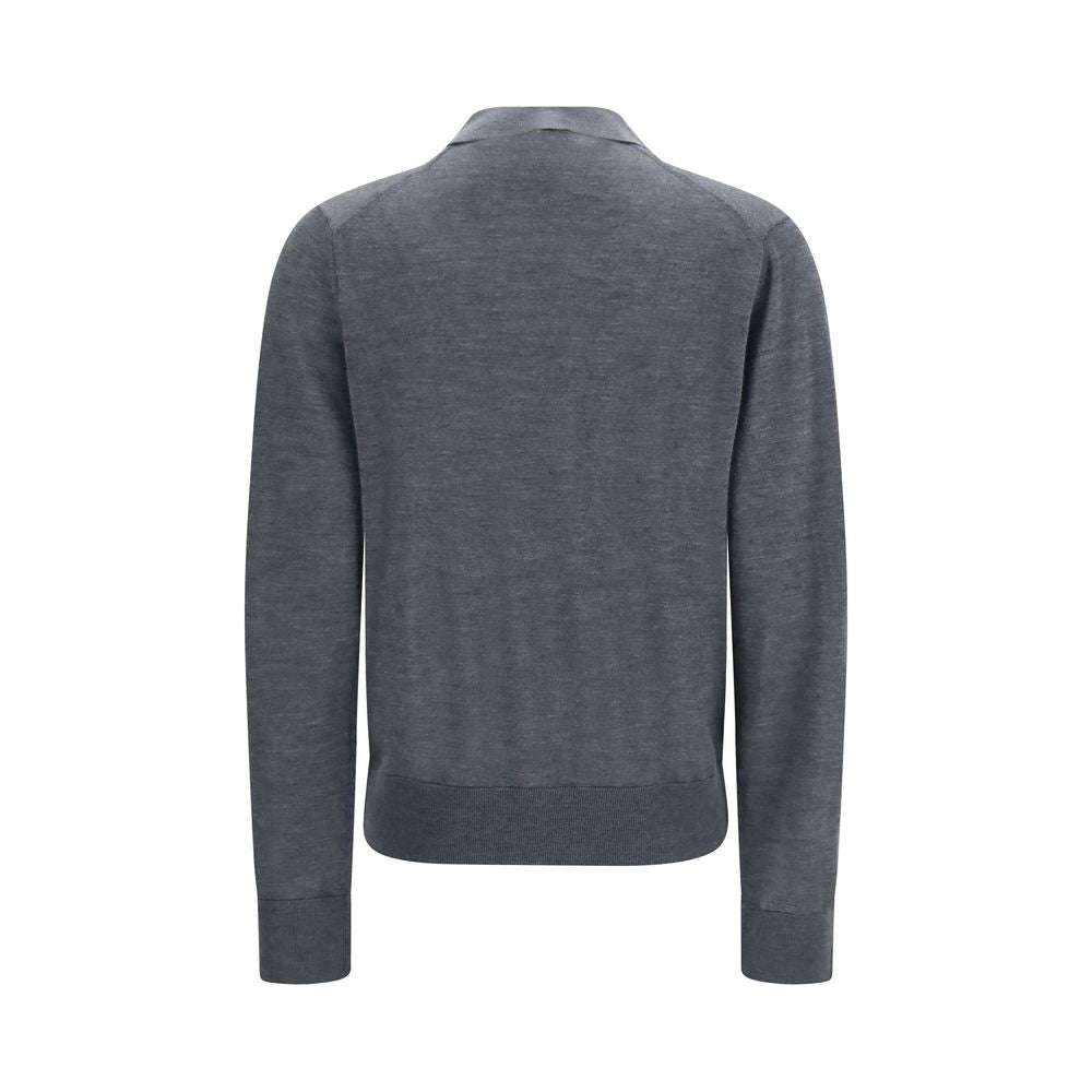 Gray cashmere shirt from Loulou De Saison, featuring a soft, luxurious fabric and classic design, worn casually.