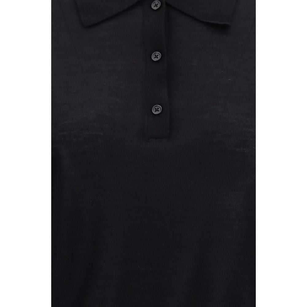 Black cashmere dress shirt by Loulou De Saison, close-up of fabric and collar detail on a sleek, sophisticated men's shirt.