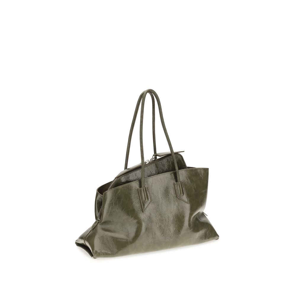 The Attico Bicolor calf leather Bos Taurus shoulder bag with top handle and gold hardware on a white background.