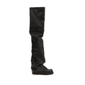 Black polyurethane over-the-knee boots by The Attico with sleek design and pointed toe, displayed on a model.