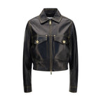 Versace black lamb Ovis Aries full-length jacket displayed on a hanger, showcasing smooth leather texture and tailored fit.