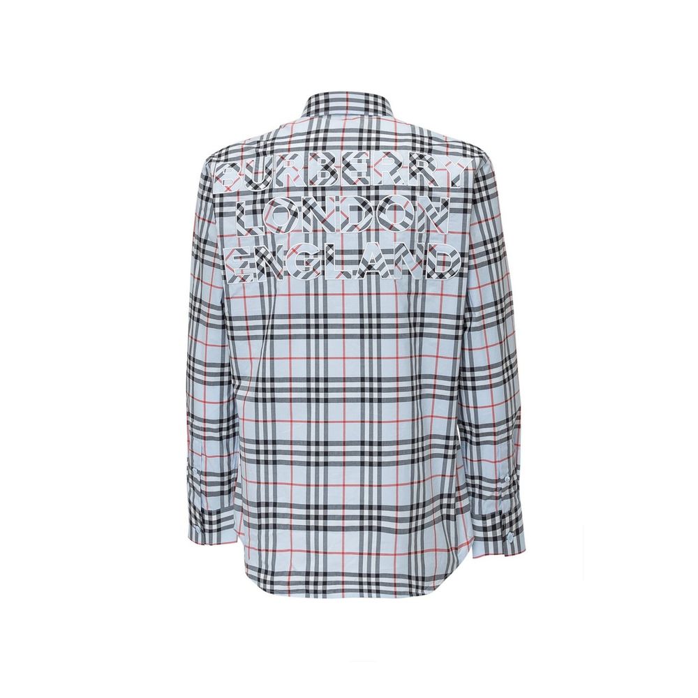 Burberry blue cotton patterned shirt with classic check design, long sleeves, and collar, displayed on a hanger.