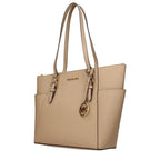 Michael Kors beige leather shoulder bag with silver hardware and adjustable strap, featuring a sleek, structured design.