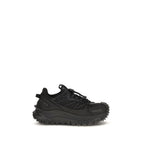Moncler Black Calf Leather Bos Taurus athletic sneakers with sleek design and athletic silhouette.