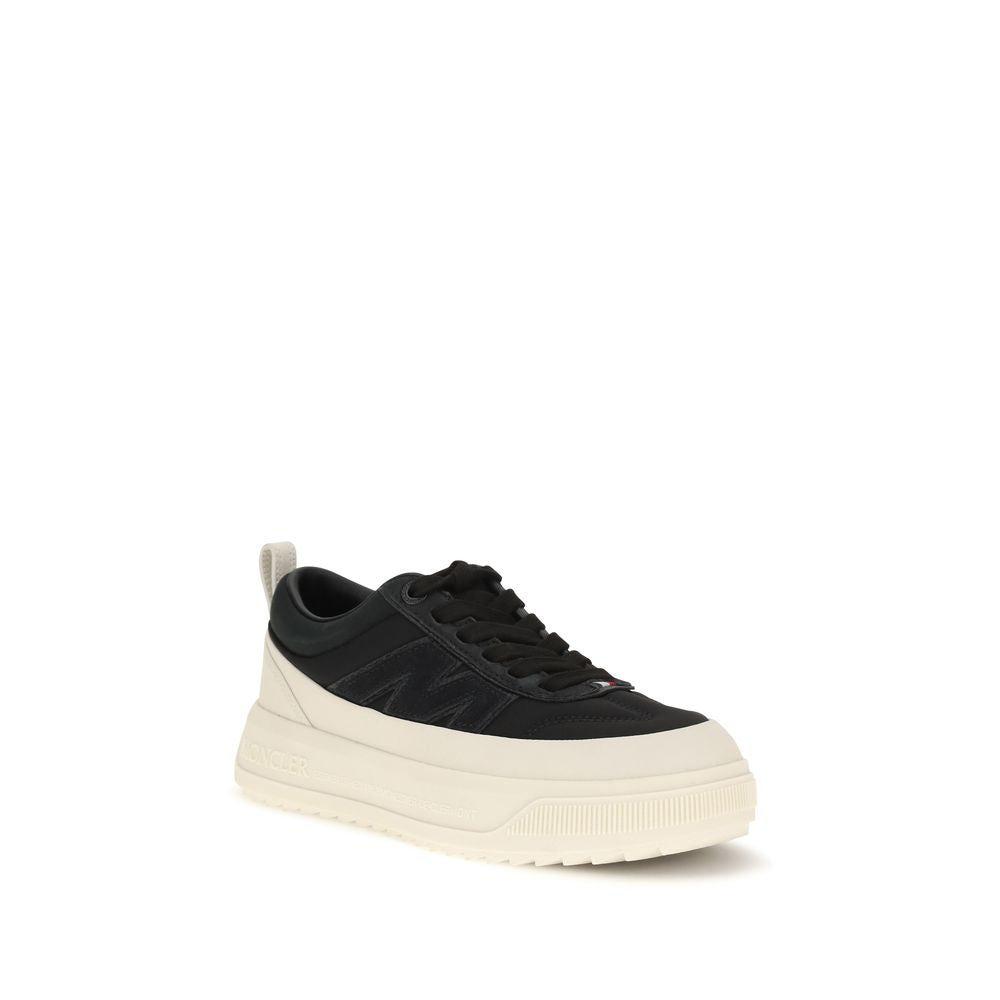 Black Moncler athletic sneakers made from durable polyamide with sleek design and sporty laces.