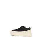 Black Moncler athletic sneakers made of durable polyamide with stylish design and sporty laces.
