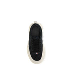 Black Moncler polyamide athletic sneakers with sporty design and sleek appearance, ideal for active and casual wear.